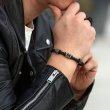 Браслет с бусиной в виде креста QB031